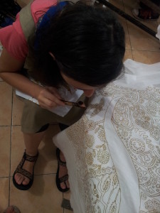 applying the wax with the canting